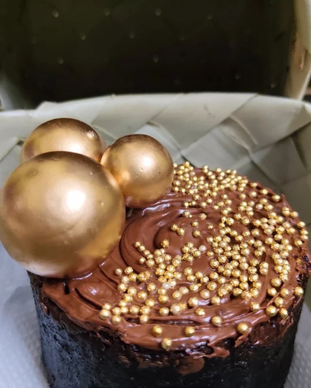 Moist chocolate cake with golden pearls